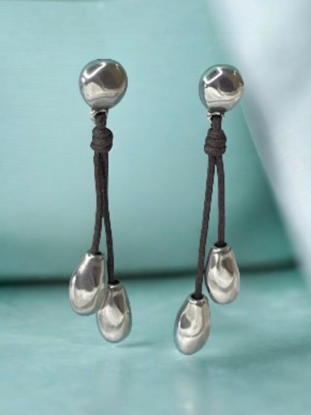 Uno de 50 silver ball dangle earrings